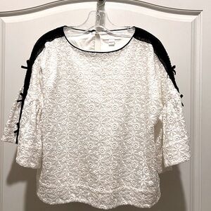 Burberry white eyelet flare sleeve top with black trim, bows
